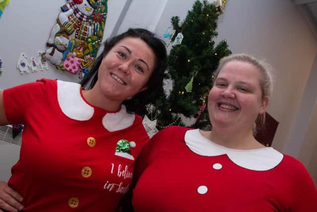 Two of Santa's helpers at the Christmas party.