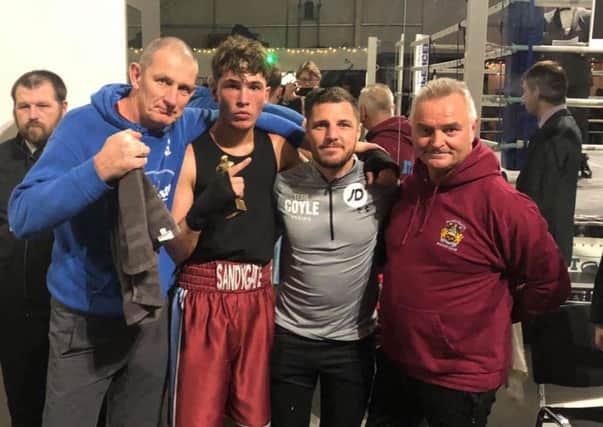 Andy Howcroft (coach), Angelo Wade, Tommy Coyle (former Commonwealth champion) and Shane Armer (coach)