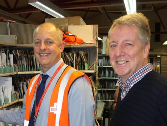 Coun. Mark Townsend, leader of Burnley Council (right) and Simon Figg, delivery office manager at Burnley sorting office.