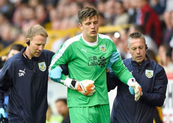 File photo dated 26-07-2018 of Burnley goalkeeper Nick Pope. PRESS ASSOCIATION Photo. Issue date: Wednesday August 1, 2018 Burnley will seek UEFA dispensation to bring in a goalkeeper for their Europa League qualifier against Aberdeen after injuries to Nick Pope and Tom Heaton, manager Sean Dyche has announced. See PA story SOCCER Burnley. Photo credit should read Ian Rutherford/PA Wire.