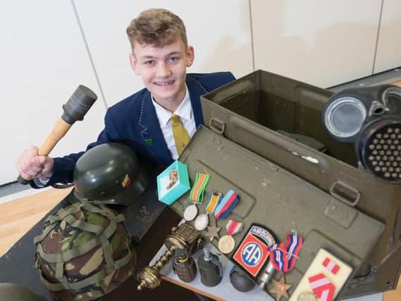 Archie Vickers with some of the items from his collection of World War One memorabilia.