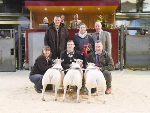 Pictured on the front row, Mary, Richard and Ian Lancaster with buyer George Cropper Jnr, of Sandersons Butchers in Baxenden, Claire Radley, from mainline sponsor Skipton NFU, and lowland judge Jim Holden on the back row.