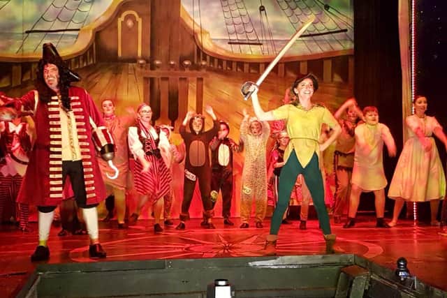 Samantha on stage as Peter Pan with the rest of the cast.