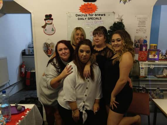Kelly (back right) with her friends and helpers at the festive lunch she laid on for the vulnerable and homeless.