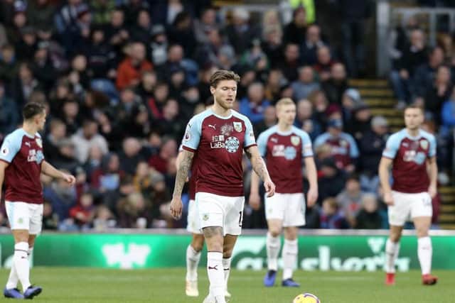 Burnley are dejected after Everton's opening goal