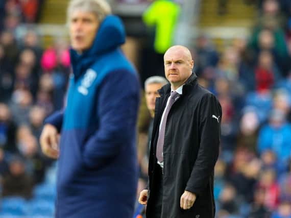 Sean Dyche watches on from the sidelines