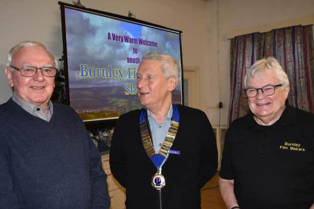 Pendleside Probus president Alan Riley (middle) with members of Burnley Film Club