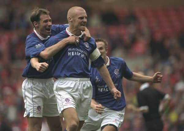 13 Apr 1997:  Sean Dyche of Chesterfield receives the congratulations for his goal during the FA Cup Semi-Final against Middlesbrough at Old Trafford in Manchester, England. The game was drawn 3-3. \ Mandatory Credit: Clive Brunskill /Allsport