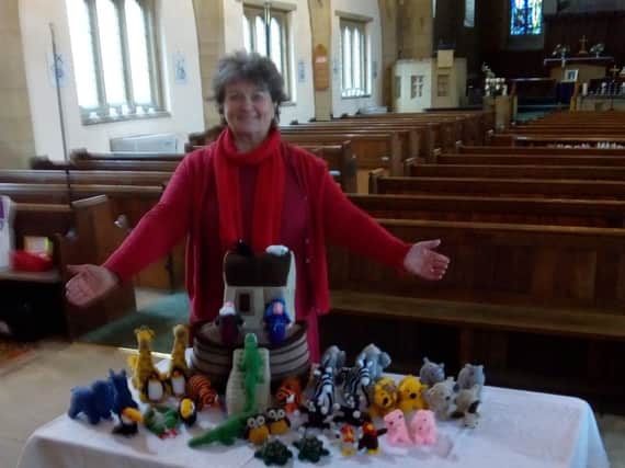Anne-Marie Foster with the knitted Noah and the Ark