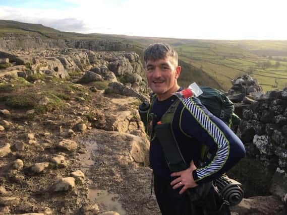 Despite severe heel pain, Paul manages to keep smiling during the Montane Spine.