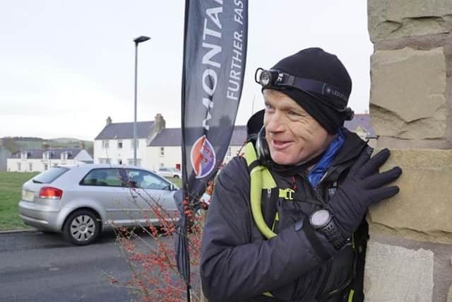 John Boothman at the finish line five days after starting the event.