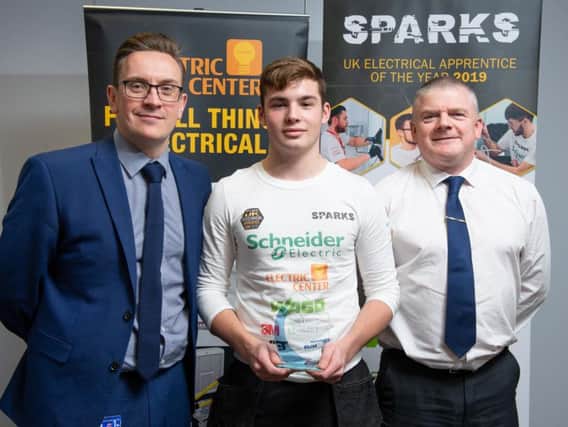 SPARKS North-West champion Zack Duxbury, centre, with David Lord, left, and Kevin Ashton.