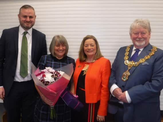 Julie is presented with her gifts by the Mayor and Mayoress of Pendle Coun. James Starkie and his wife Janet and Pendle MP Andrew Stephenson.
