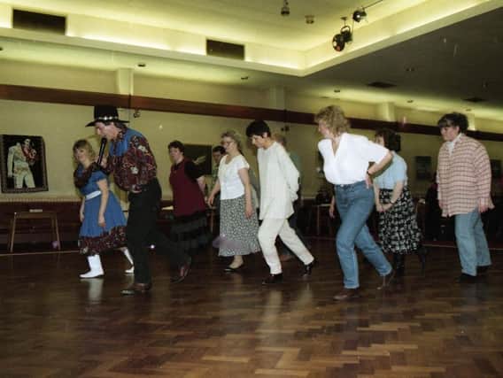 Dancing duo John and Janette Sandham detested Country and Western music - until a two-week stint at a holiday camp convention changed their minds. Now the couple are bringing a taste of the latest American craze - American Line Dancing - to Preston