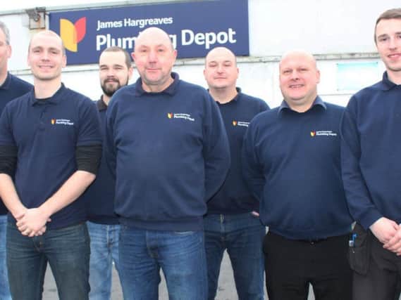 The record-breakers at Burnley branch of James Hargreaves are (from left to right) Jeremy Shaw, Leigh Simmonds, Tony Wilkinson, Robert England, Wayne Hughes (assistant manager), manager Adrian Hope and Jack Hargreaves.