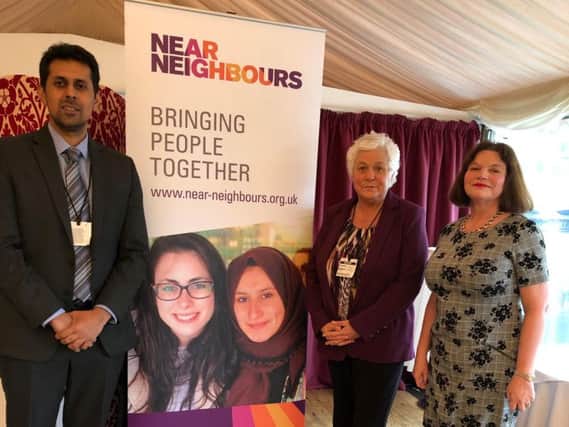 (Left to right) Burnley councillors Afrasiab Anwar and Bea Foster with Julie Cooper at a Near Neighbours event in Westminster