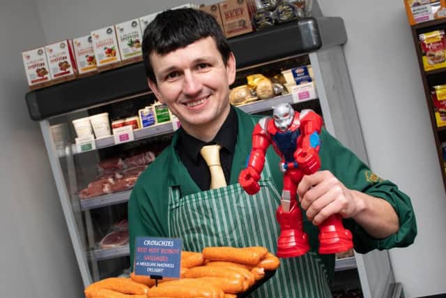 Danny Heys with his Peter Crouch inspired sausages