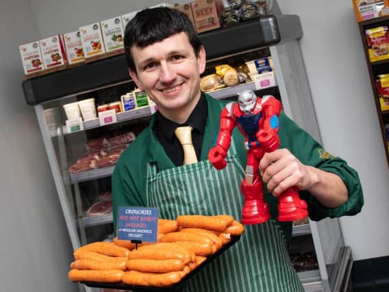 Danny Heys with his Peter Crouch inspired sausages