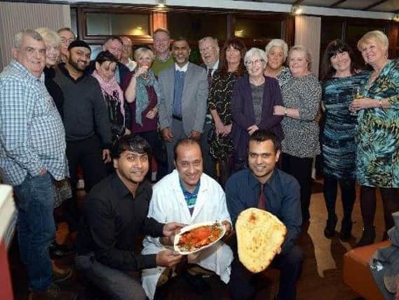 Guests and organisers at last year's curry night at the Usha in aid of the charity Emmaus.