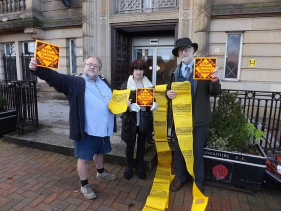 Campaigners David Whipp, Dorothy Lord, Tony Greaves outside County Hall, Preston