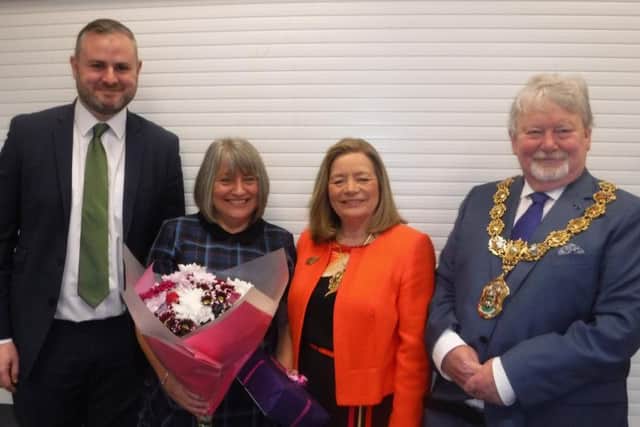 Julie is presented with gifts at her retirement from Pendle MP Andrew Stephenson and the Mayor and Mayoress of Pendle Coun. James Starkie and his wife Janet.