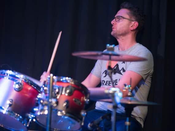 Andy Henderson, the drummer for Northern Social Band. (s)