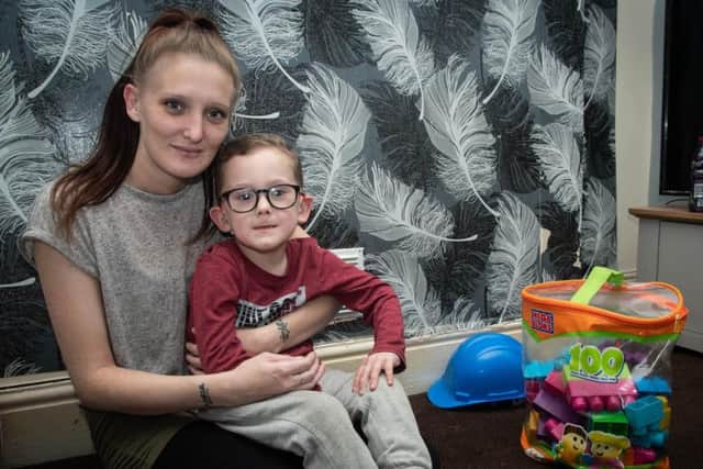 Samantha Dutton with her son Daniel, who is profoundly deaf. (s)