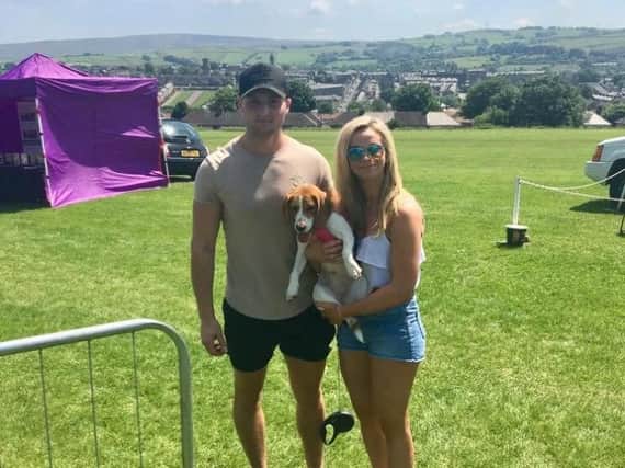Chloe Elliott and Nick Weinberg with their pet beagle Rosie who staged a massive search in Pendle when she went missing in December.