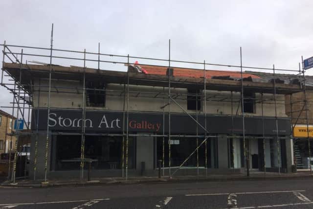 Work is progressing today to re-build the Storm Art Gallery.