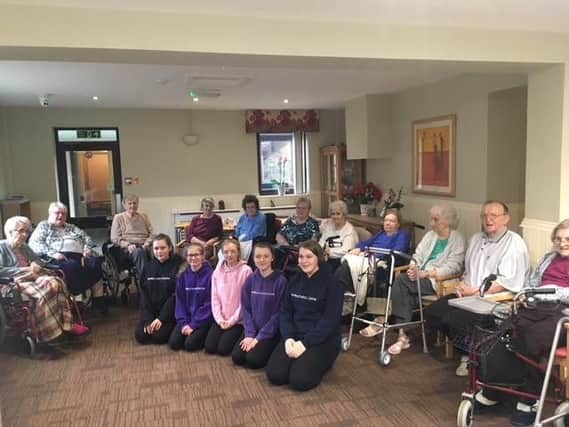 Residents at the Grove Care Home wait to be entertained by members of Burnley Dance Centre.