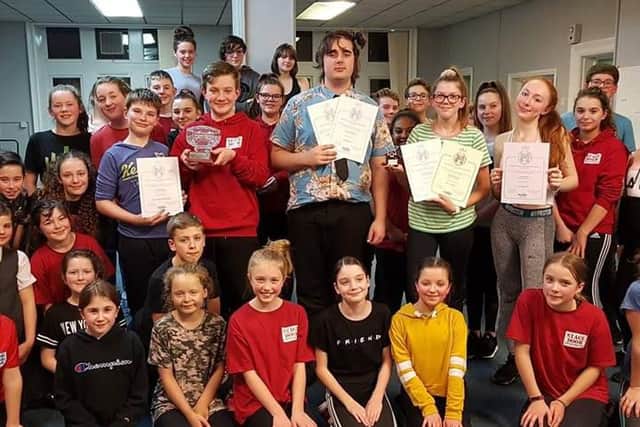 A total of 35 members of Stage Door Youth Theatre, Colne, have achieved distinctions in their recent LANDA exams. (s)
