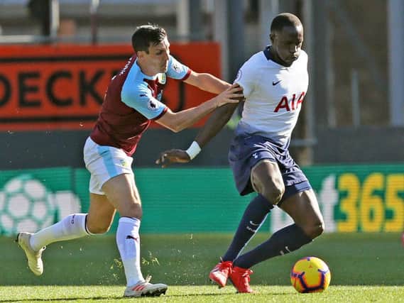 Tottenham Hotspur's Moussa Sissoko shields the ball from Burnley's Jack Cork