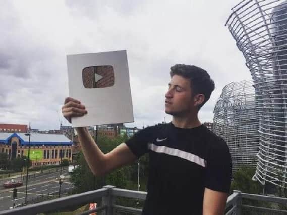 Burnley YouTuber Vizeh with his plaque for reaching 100,000 subscribers.