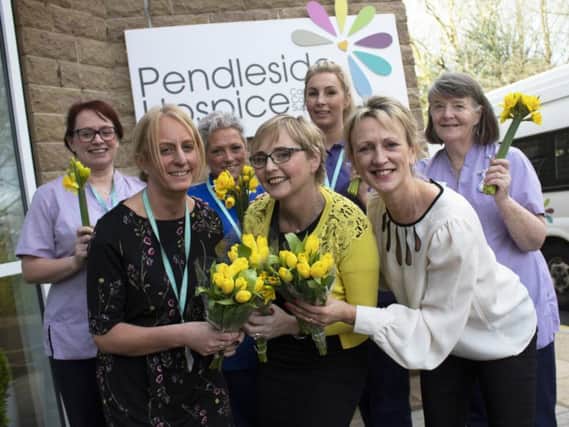 Front, left to right: Helen McVey (Chief Executive, Pendleside), Vanessa Robinson (The Bee Hive) and Christina Cope (Head of Corporate Fundraising Pendleside) with Pendleside Hospice staff, Kate, Karen, Emily and Lizzy looking on.