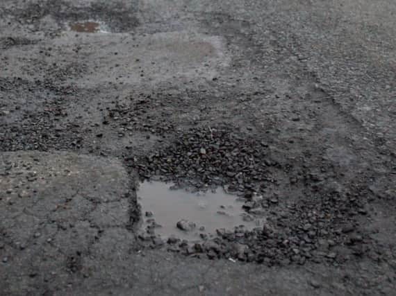Potholes like this are becoming a common sight on Pendle's roads