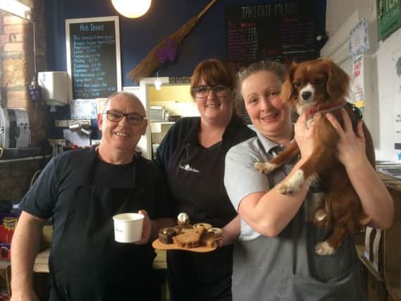 Pictured at the launch of the doggy afternoon teas are (from left to right) Sanwitches cafe owners David and Christine Moore with Diane Murphy the owner of Millie and Ruby's dog baker with Pippa.