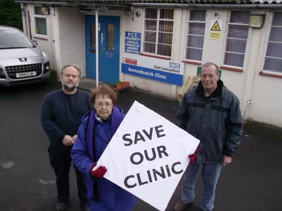 Coun. Ken Hartley with colleagues Marjorie Adams and David Whipp campaigning to keep Butts Clinic open