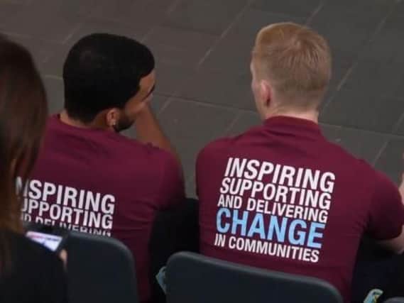 Burnley FC players Aaron Lennon (left) and Ben Mee at the BFCitC launch event.
