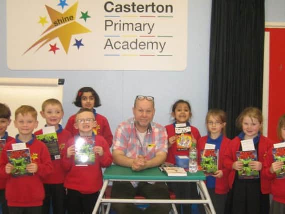 Casterton Primary Academy students with author Ian Billings.