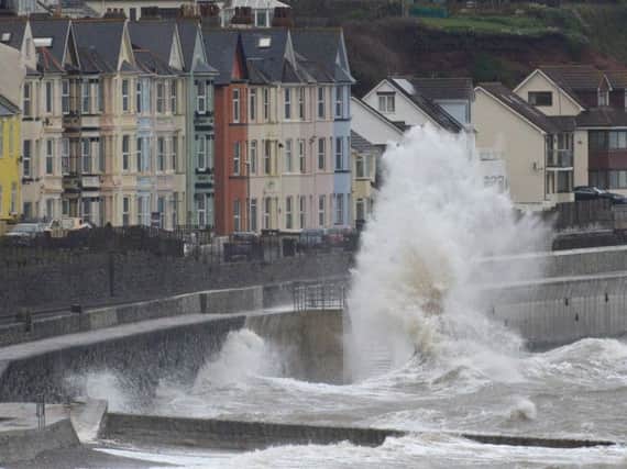 A spell of strong winds has hit the North West and weather warnings has been put in place.