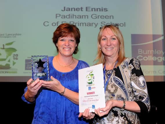Burnley College Assistant Principal Alison Cameron-Brandwood (right) presents Mrs Ennis with her Inspirational Teacher award in 2016