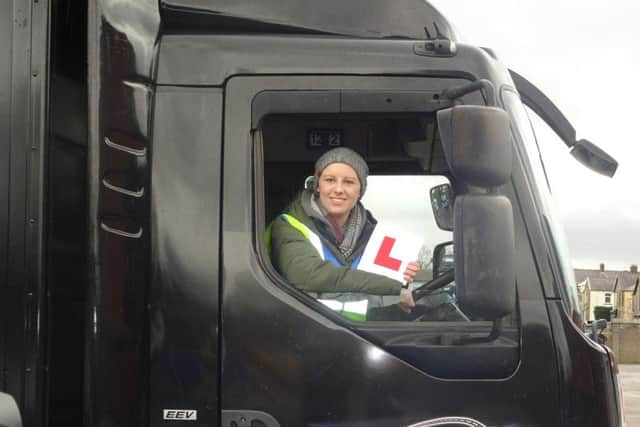 Laura Nuttall behind the wheel of the DAF truck