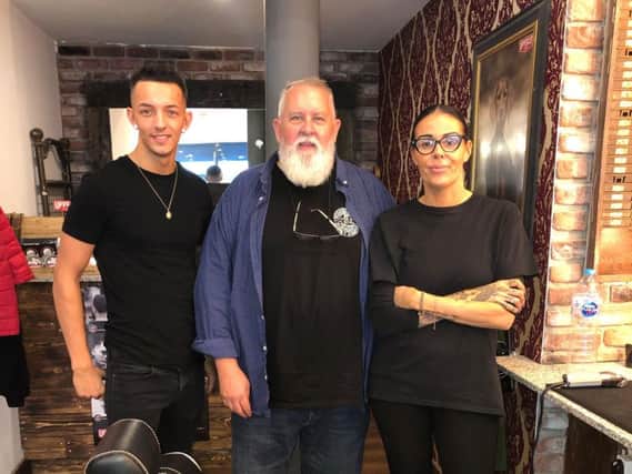 Annette and Wilson welcome Mike Holtzer, the Chief Executive Office of Upper Cut Deluxe, to their new Burnley barber shop.