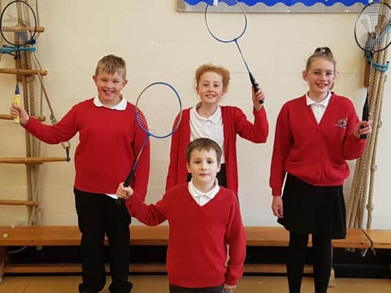 The victorious badminton team from Earby Springfield Primary School are: ( back row) James Maybury ( 10) Rosie Hill (10,) Leah Jarvis (11).  Front Seth Rawlinson (eight).