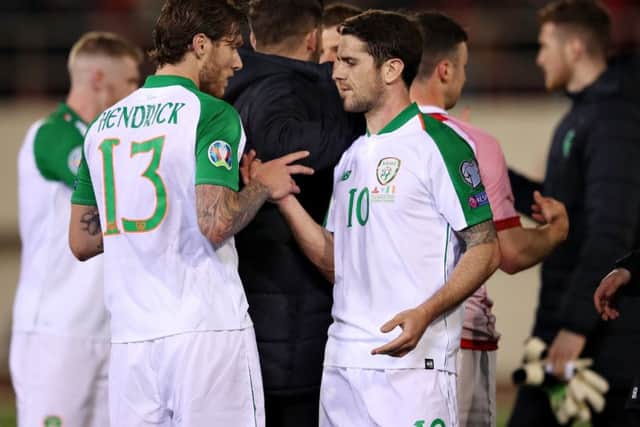 GIBRALTAR, GIBRALTAR - MARCH 23: Jeff Hendrick of Republic of Ireland shakes hands with teammate Robbie Brady after the 2020 UEFA European Championships group D qualifying match between Gibraltar and Republic of Ireland at Victoria Stadium on March 23, 2019 in Gibraltar, Gibraltar. (Photo by Alex Pantling/Getty Images)