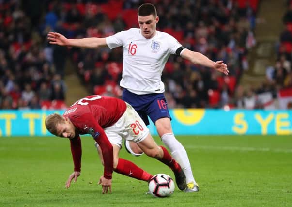 LONDON, ENGLAND - MARCH 22:  Declan Rice of England battles with Matej Vydra of the Czech Republic during the 2020 UEFA European Championships Group A qualifying match between England and Czech Republic at Wembley Stadium on March 22, 2019 in London, United Kingdom. (Photo by Catherine Ivill/Getty Images)