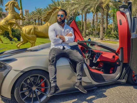 Amor founder Mujahaid Bin Jamshaid in Dubai with a McLaren after doing some work with the car manufacturer.