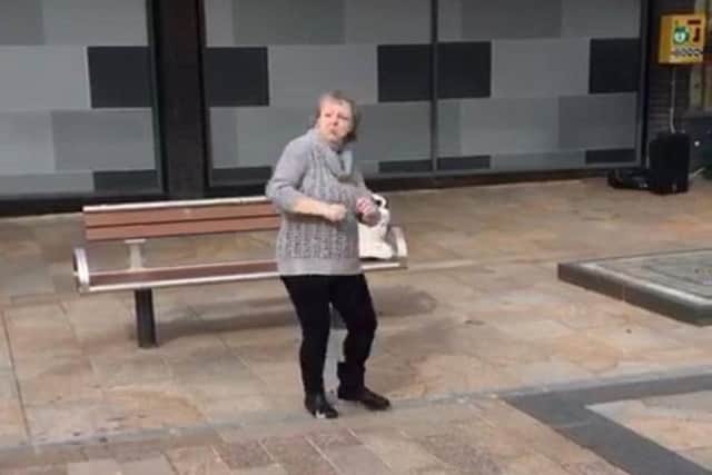 Do you know who this mystery lady is who brought a ray of sunshine to Burnley town centre when she broke into an impromptu dance routine?