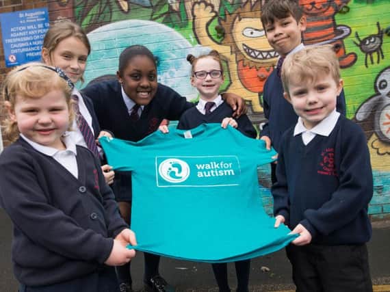 Pupils at St  Augustine's RC Primary School in Burnley walked 2,000 steps every day for a week to help raise awareness of autism.