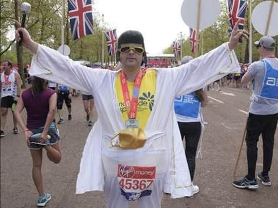 Andrew in his fat Elvis costume at the end of last year's London Marathon